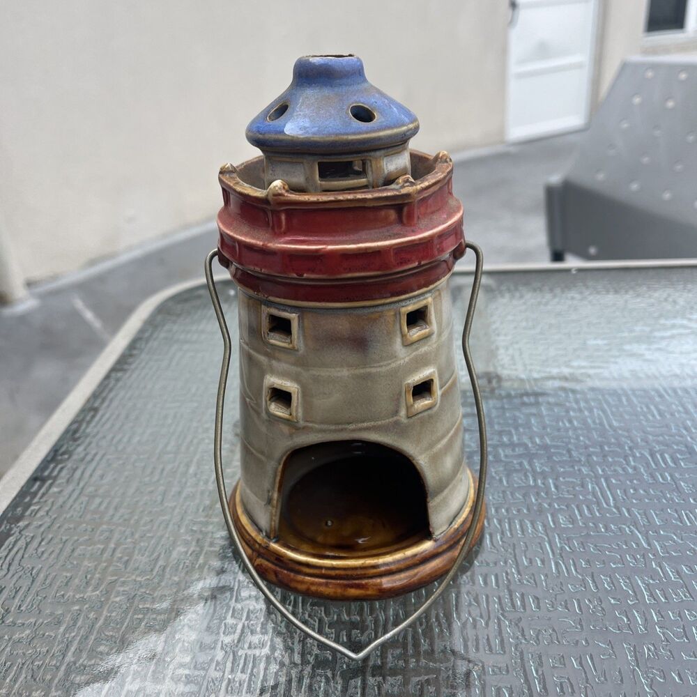 Vintage style lighthouse tea light holder with metal hanger